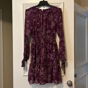 Gal meets glam purple floral dress.